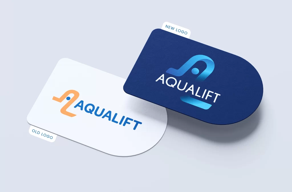 Comparison of Aqualift's old logo on a white card (orange and blue design) and new logo on a navy blue card (blue gradient design) highlights the brand development for small business.