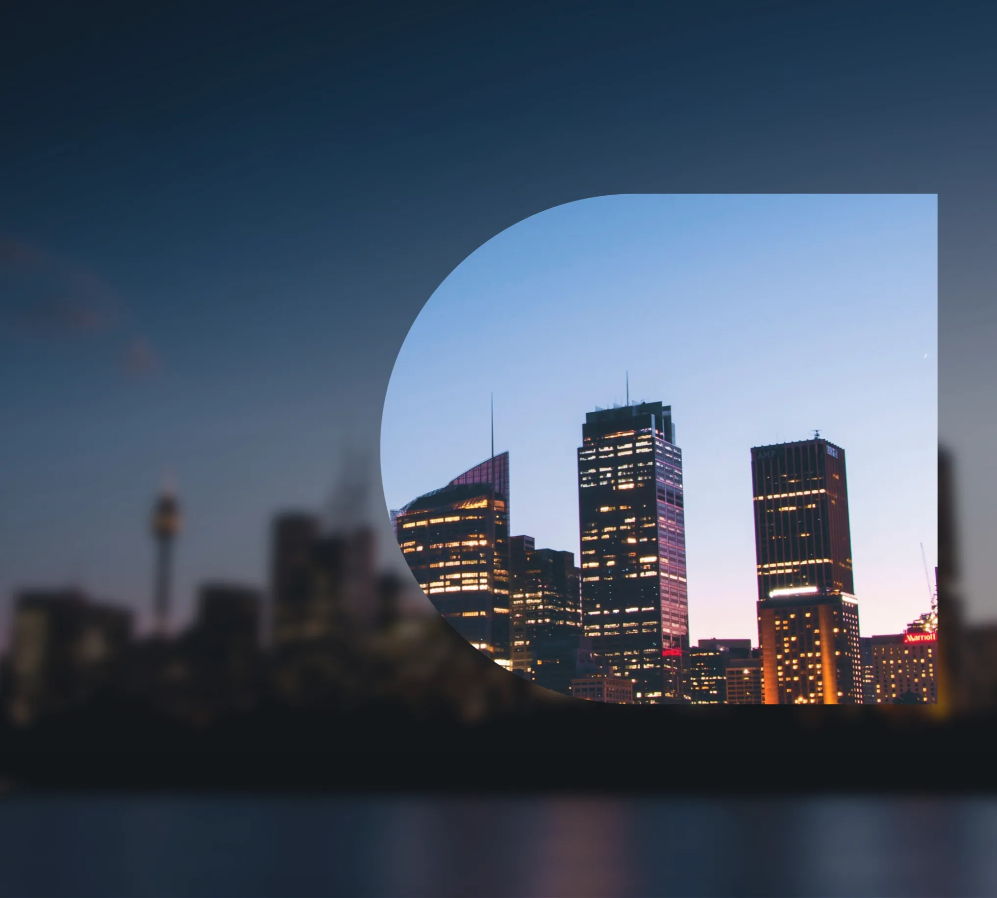 A city skyline at twilight, featuring several illuminated skyscrapers framed by a large, transparent, curved shape on the right side of the image.